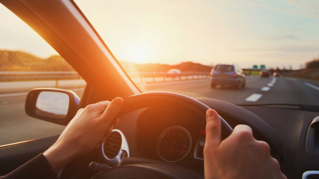 Close-up of a car steering wheel and dashboard gauges, symbolizing why resolutions fail when goals are too rigid instead of allowing flexibility, adaptation, and personal transformation along the journey.